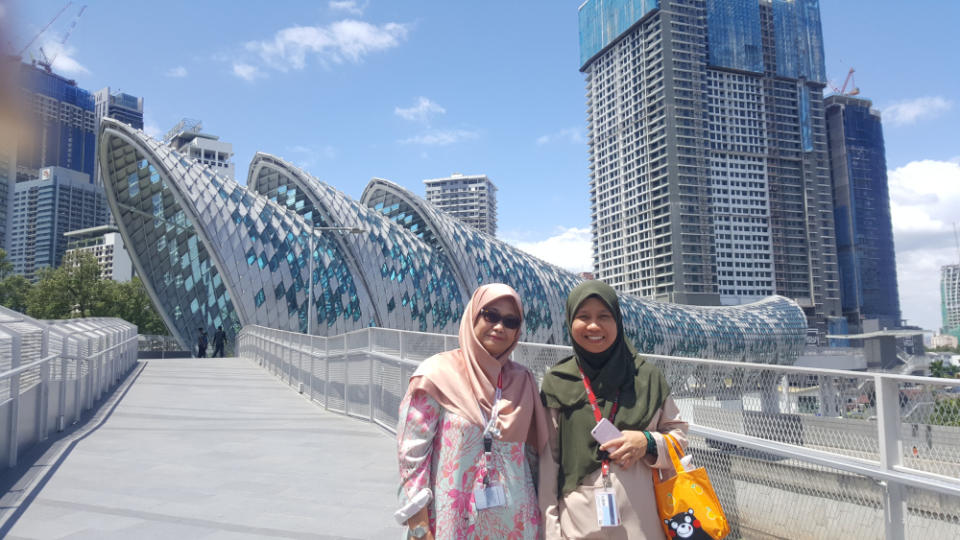 Colleagues Zarahyah Aziz (left) and Nina Abdullah took the walk to Kampung Baru to hunt for food. — Picture by R. Loheswar