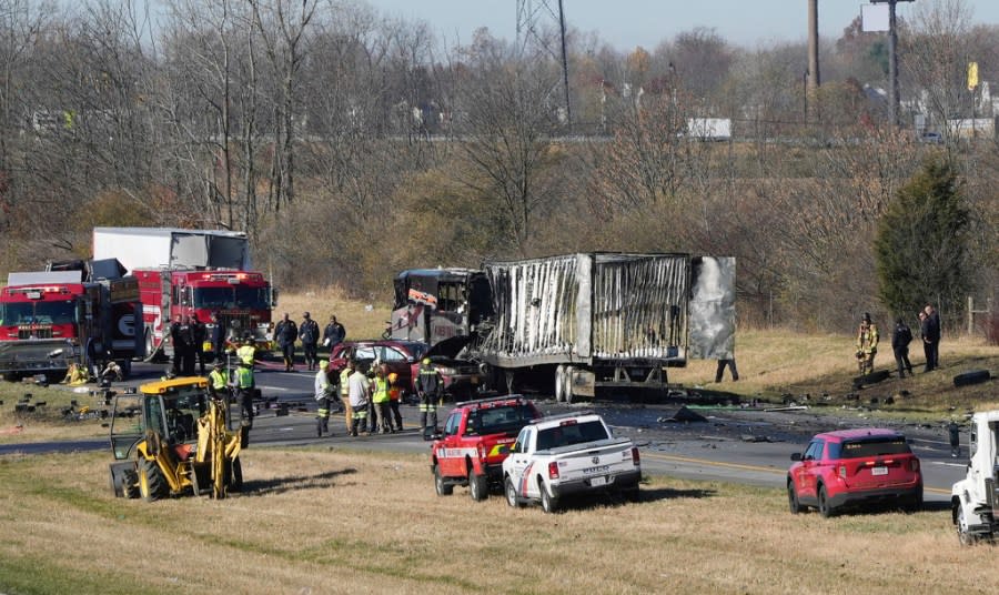 Both directions of Interstate 70 are closed in Licking County, Ohio, near the State Route 310 interchange after a fatal accident on Tuesday, Nov. 14, 2023. A charter bus carrying students from a high school was rear-ended by a semi-truck on the Ohio highway. (Barbara Perenic /The Columbus Dispatch via AP)