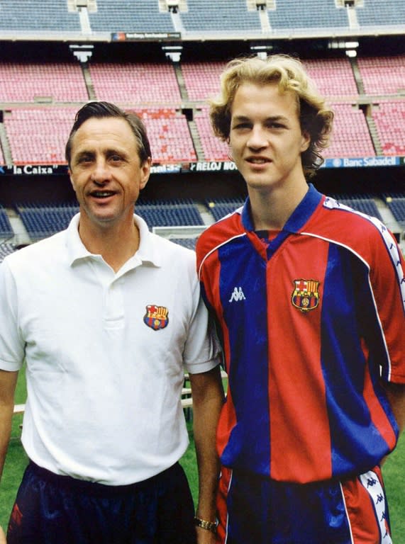 Dutch football star Johan Cruyff (L) posing with his son Jordi in Barcelona in 1995