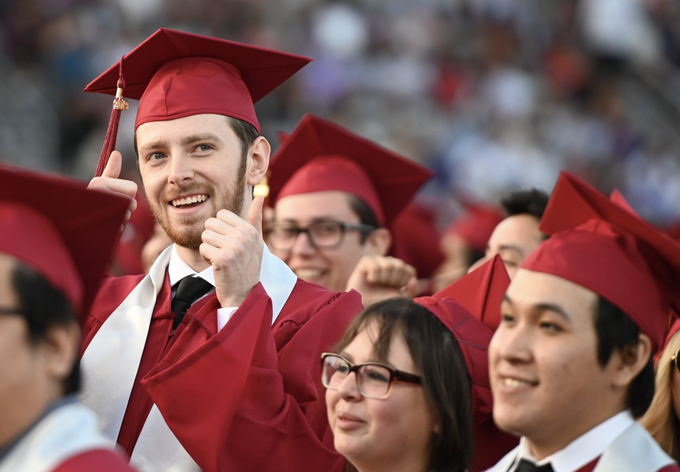 Students earning degrees at Pasadena City College participate in the graduation ceremony, June 14, 2019, in Pasadena, California. (Photo: ROBYN BECK/AFP via Getty Images) 