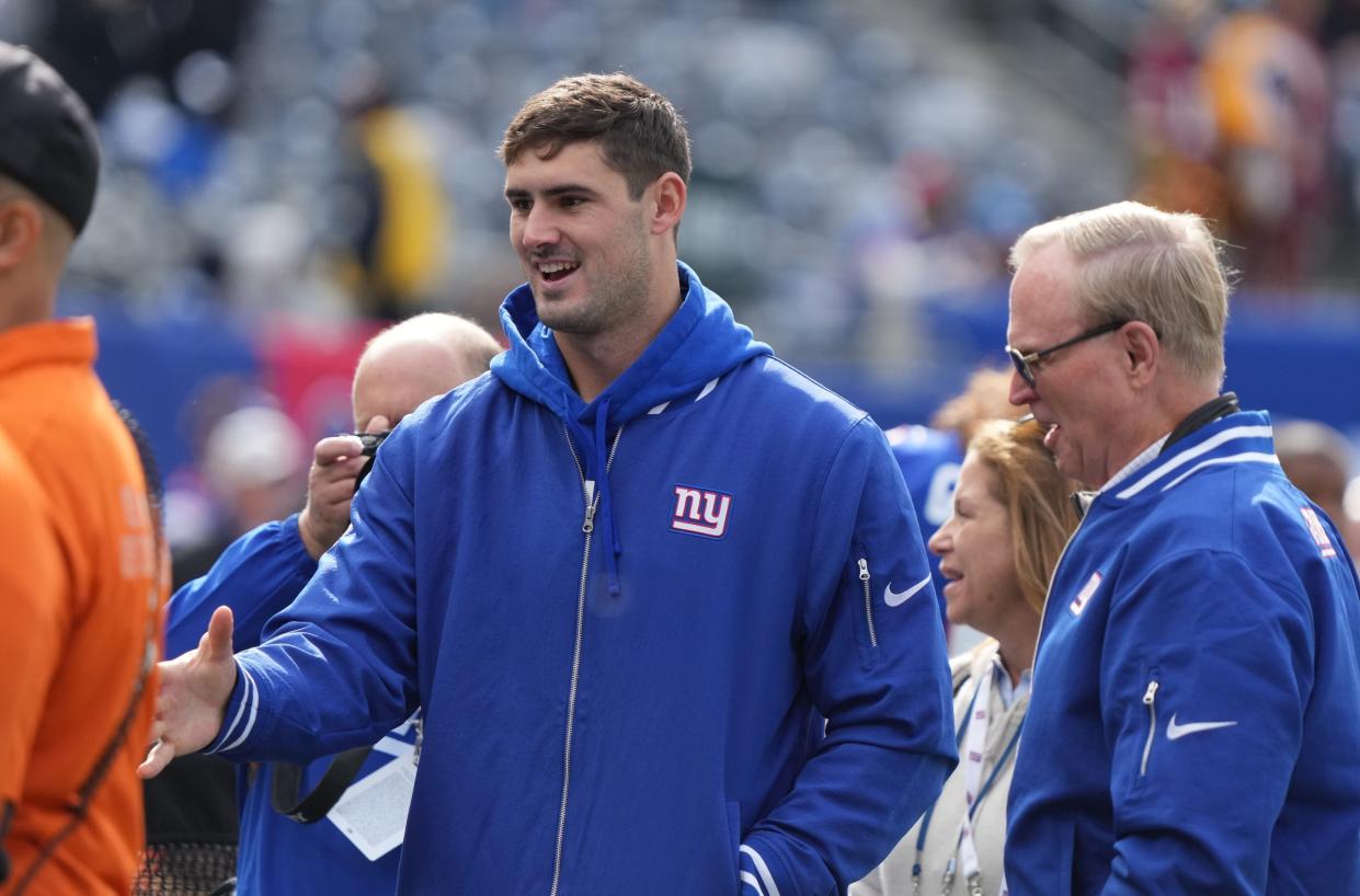 East Rutherford, NJ â€” October 22, 2023 -- Giants quarterback, Daniel Jones and owner John Mara on the sidelines before the game. The NY Giants host the Washington Commanders at MetLife Stadium in East Rutherford, NJ on October 22, 2023.