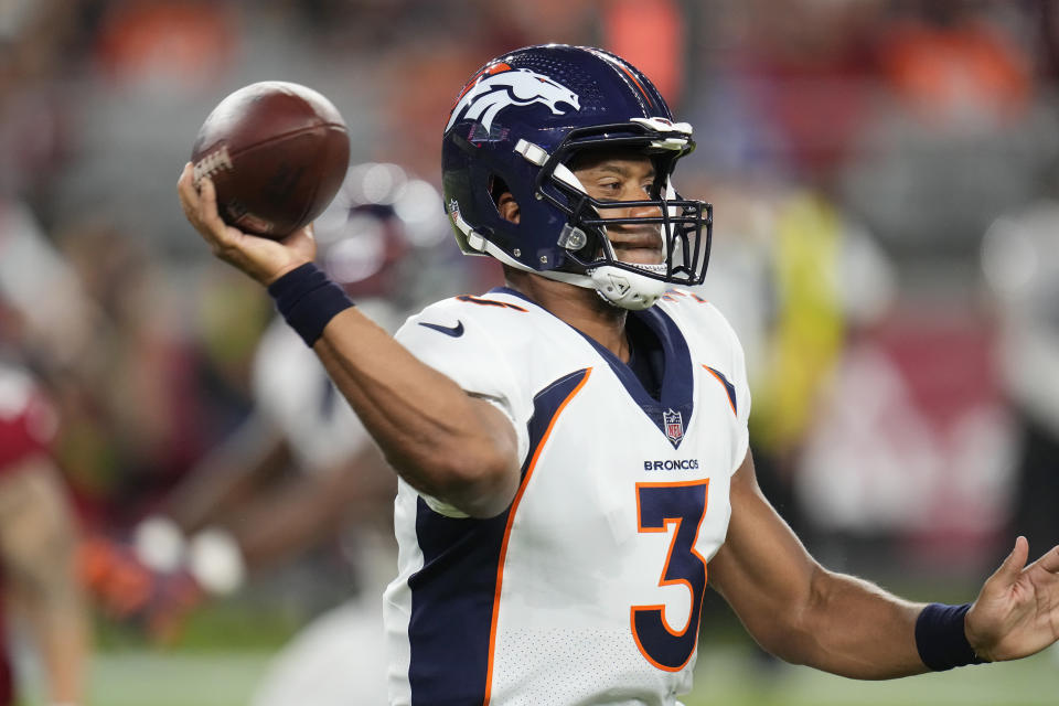 Denver Broncos quarterback Russell Wilson (3) passes against the Arizona Cardinals during the first half of an NFL preseason football game, Friday, Aug. 11, 2023, in Glendale, Ariz. (AP Photo/Ross D. Franklin)