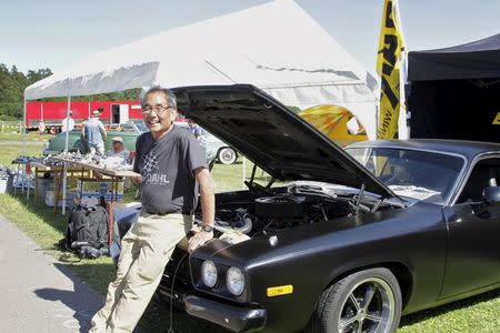 Al Young, a former World Champion drag racer from Seattle, poses with his 1973 Plymouth Road Runner after arriving in Sweden for the Power Big Meet show in Vasteras, Sweden, July 2, 2015. REUTERS/Philip O'Connor