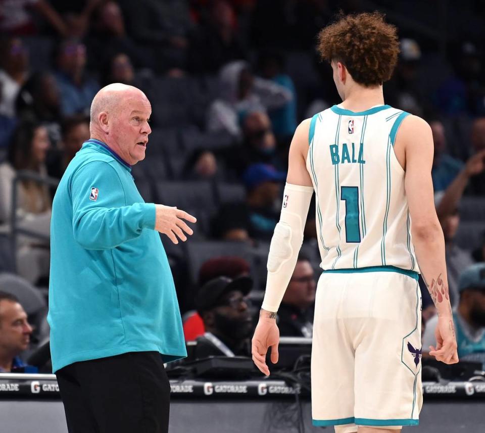 Charlotte Hornets head coach Steve Clifford, left, speaks with guard LaMelo Ball, right, during first half action against the Washington Wizards on Monday, October 10, 2022 at Spectrum Center in Charlotte, NC. The Hornets hosted the Washington Wizards in NBA preseason action.