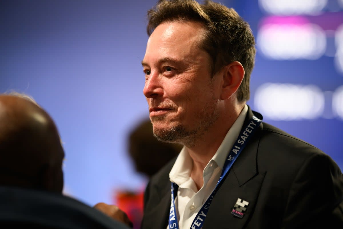 Hot off his appearance at the AI Safety Summit, Elon Musk has unveiled his AI company's answer to ChatGPT (Leon Neal/PA)