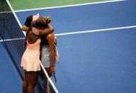 Tennis - US Open - Womens Final - New York, U.S. - September 9, 2017 - Madison Keys (R) of the United States is consoled by winner Sloane Stephens of the United States. REUTERS/Shannon Stapleton