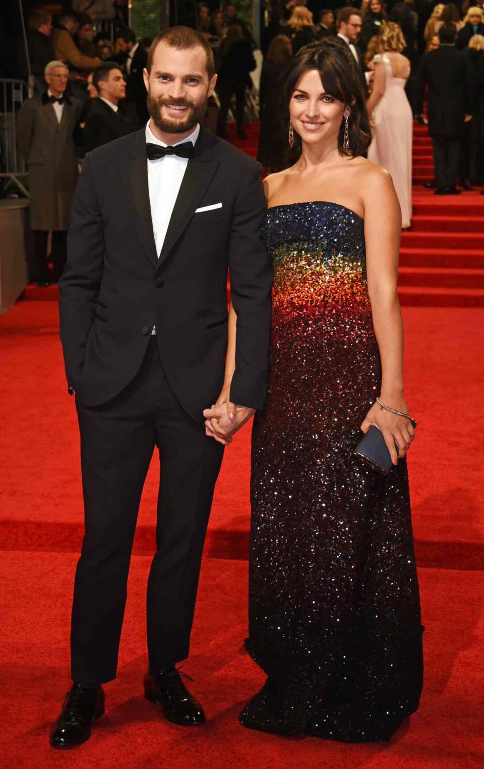 Jamie Dornan (L) and Amelia Warner attend the 70th EE British Academy Film Awards (BAFTA) at Royal Albert Hall on February 12, 2017 in London, England