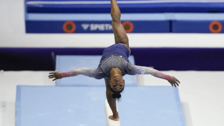 United States’ Simone Biles competes on the beam during the women’s team final at the Artistic Gymnastics World Championships in Antwerp, Belgium Wednesday. (Photo: Virginia Mayo/AP)