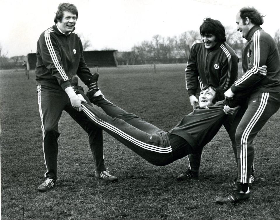 Sandy Carmichael, celebrating his 30th birthday in 1974, gets customary treatment from team mates (from left) Gordon Brown, Ian McLauchlan and Nairn McEwan - daily record/mirrorpix