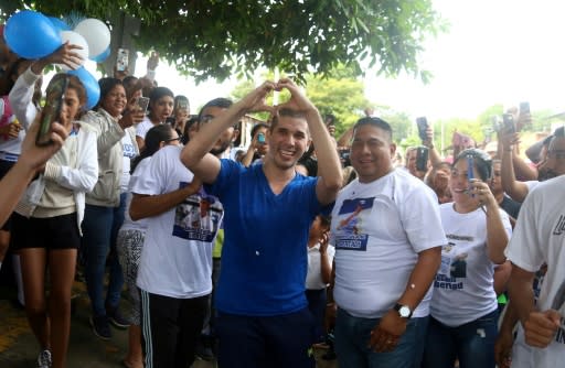 Student leader Edwin Carcache (C) celebrates after being released from prison in Managua, Nicaragua, on June 11, 2019