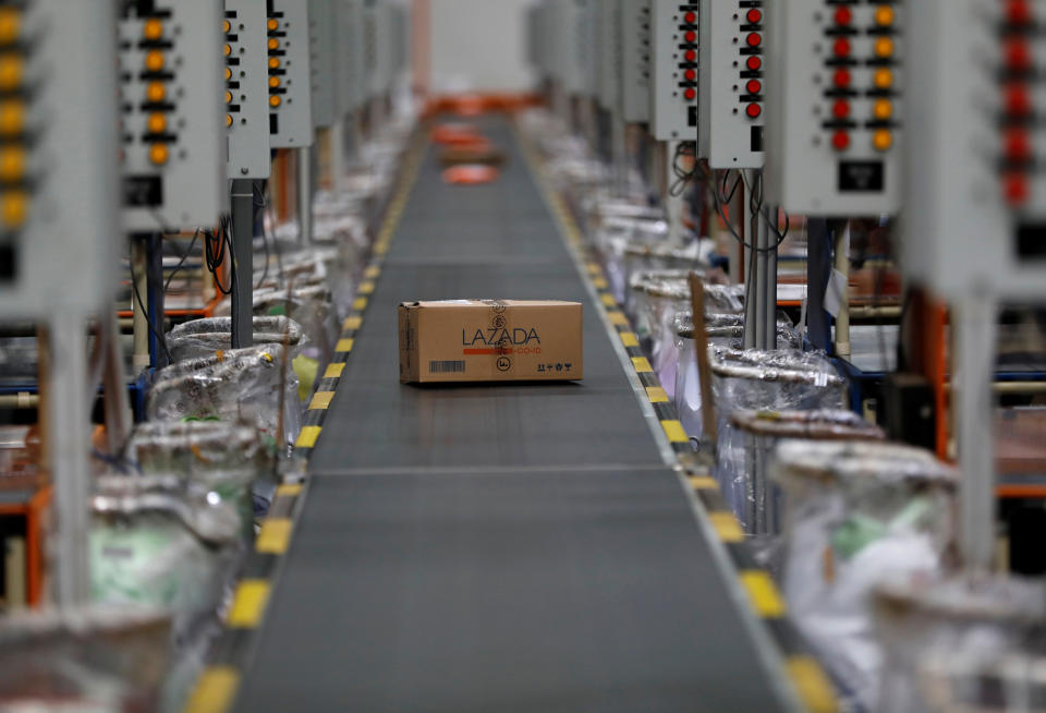 A package for delivery is seen on a conveyor belt at online retailer Lazada's warehouse in Depok, south of Jakarta, Indonesia March 26, 2018. Picture taken March 26, 2018. REUTERS/Darren Whiteside