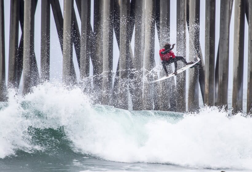 Cherif Fall, surf champion of Senegal, goes airborne off a big wave