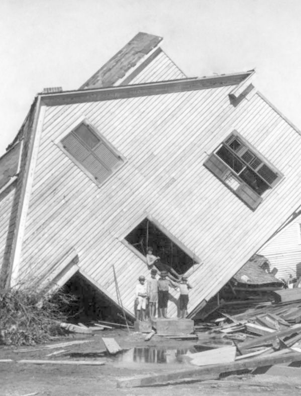 house turned on its side by hurricane