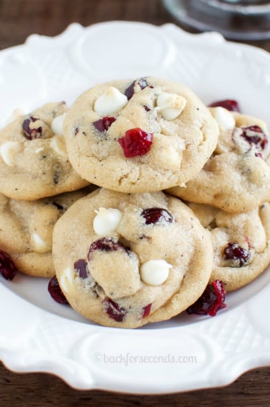 <p>Back For Seconds</p><p>These are the white chocolate cranberry cookies ever! Sweet and tart, and thick, soft, and chewy with a secret ingredient that makes them amazing!! </p><p>Get the recipe: <a href="http://backforseconds.com/best-white-chocolate-cranberry-cookies/" rel="nofollow noopener" target="_blank" data-ylk="slk:Best White Chocolate Cranberry Cookies;elm:context_link;itc:0;sec:content-canvas" class="link rapid-noclick-resp"><strong>Best White Chocolate Cranberry Cookies</strong></a></p>