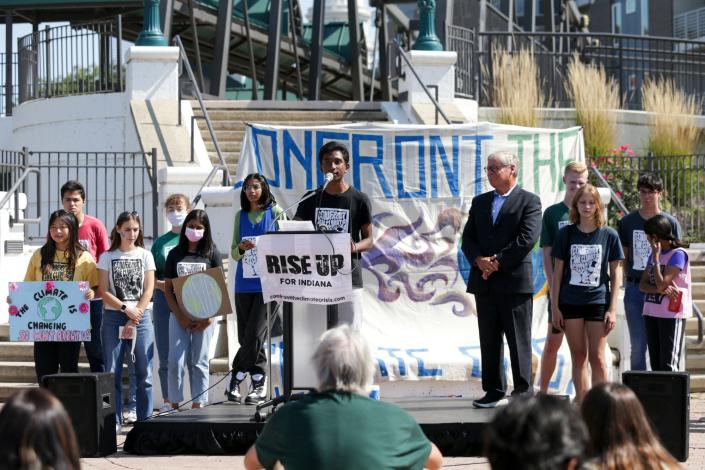 Rahul Durai, a sophomore at West Lafayette Jr./Sr. high school, speaks during the Confront the Climate Crisis rally on the John T. Myers Pedestrian Bridge, Friday, Sept. 24, 2021 in Lafayette.