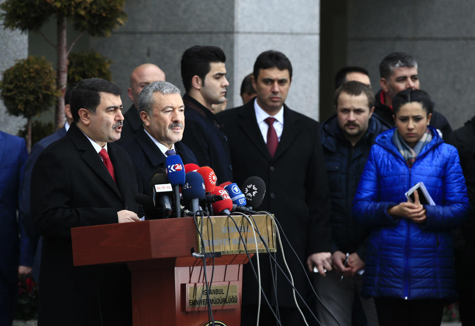 Istanbul Gov. Vasip Sahin, left, accompanied by Police Chief Mustafa Caliskan, second from left, talks to the media during a news conference regarding the arrest of a suspect of New Year's nightclub attack in Istanbul, Tuesday, Jan. 17, 2017. Turkish officials on Tuesday confirmed that the gunman who carried out the deadly New Year's attack on an Istanbul nightclub, which was claimed by the Islamic State group, has been detained. (AP Photo/Lefteris Pitarakis)