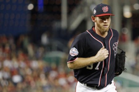 Jul 20, 2018; Washington, DC, USA; Washington Nationals starting pitcher Stephen Strasburg (37) leaves the game after being removed against the Atlanta Braves in the fifth inning at Nationals Park. Mandatory Credit: Geoff Burke-USA TODAY Sports