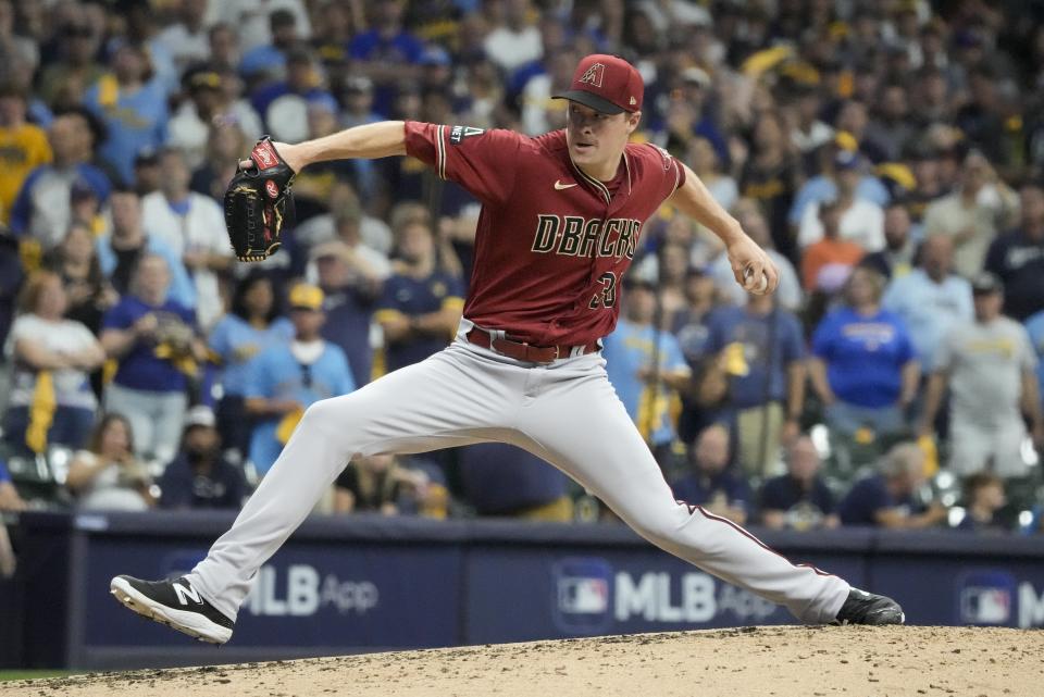 Arizona Diamondbacks relief pitcher Joe Mantiply throws during the third inning of a Game 1 of their National League wildcard baseball game against the Milwaukee Brewers Tuesday, Oct. 3, 2023, in Milwaukee. (AP Photo/Morry Gash)