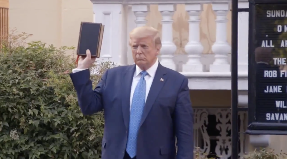 Donald Trump holds up a bible outside of St John's church in Washington DC as George Floyd protests happened nearby.