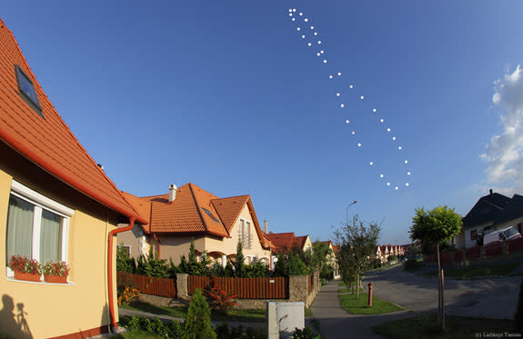 More than 30 images were taken to make this composite photo of the sun's movement across the sky in 2011. The images shows what scientists call the analemma, the movement of the sun in the sky over the course of a year. The background image was