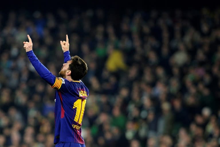 Barcelona's forward Lionel Messi celebrates after scoring a goal against Real Betis on January 21, 2018