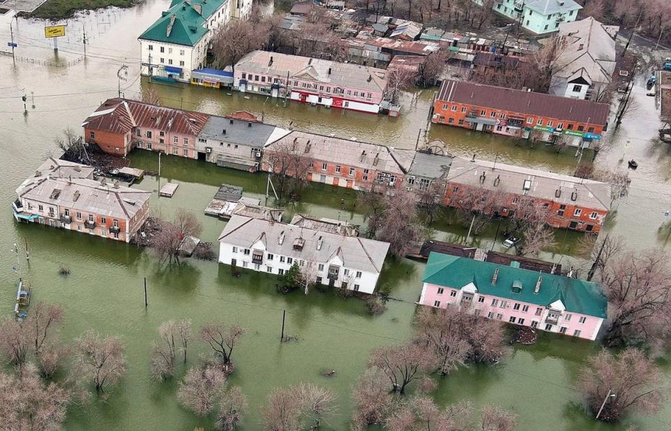 An aerial picture taken on 8 April shows the flooded part of the city of Orsk (Getty)