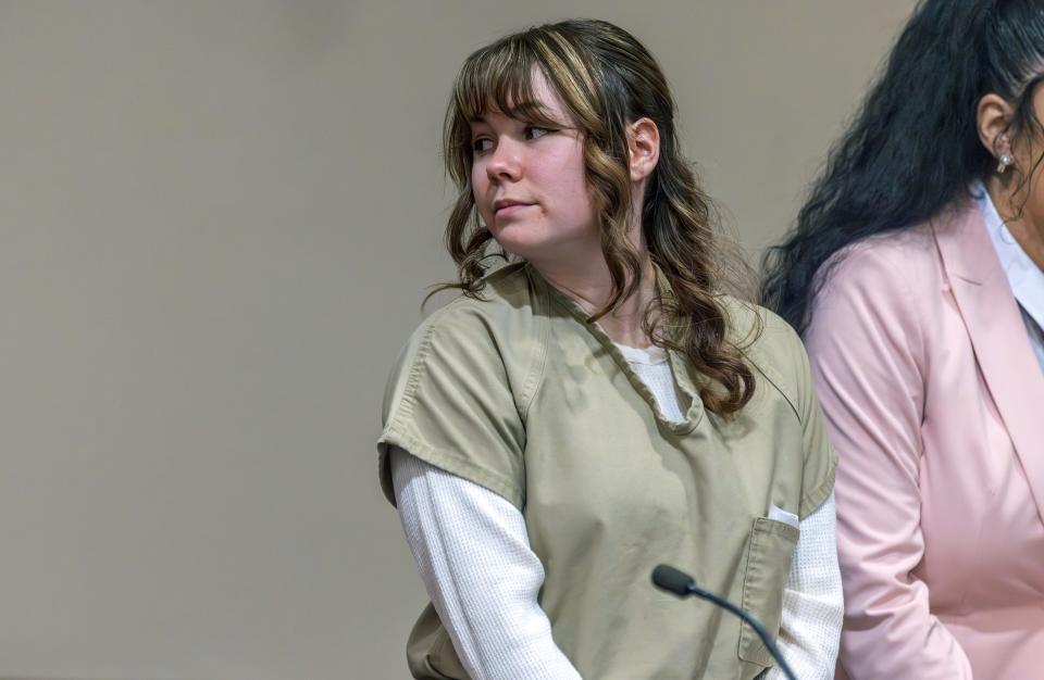 Hannah Gutierrez-Reed (left), the former armorer of the Western film "Rust," looks back at her family members during her sentencing hearing at the First Judicial District Courthouse in Santa Fe, New Mexico, on April 15, 2024.