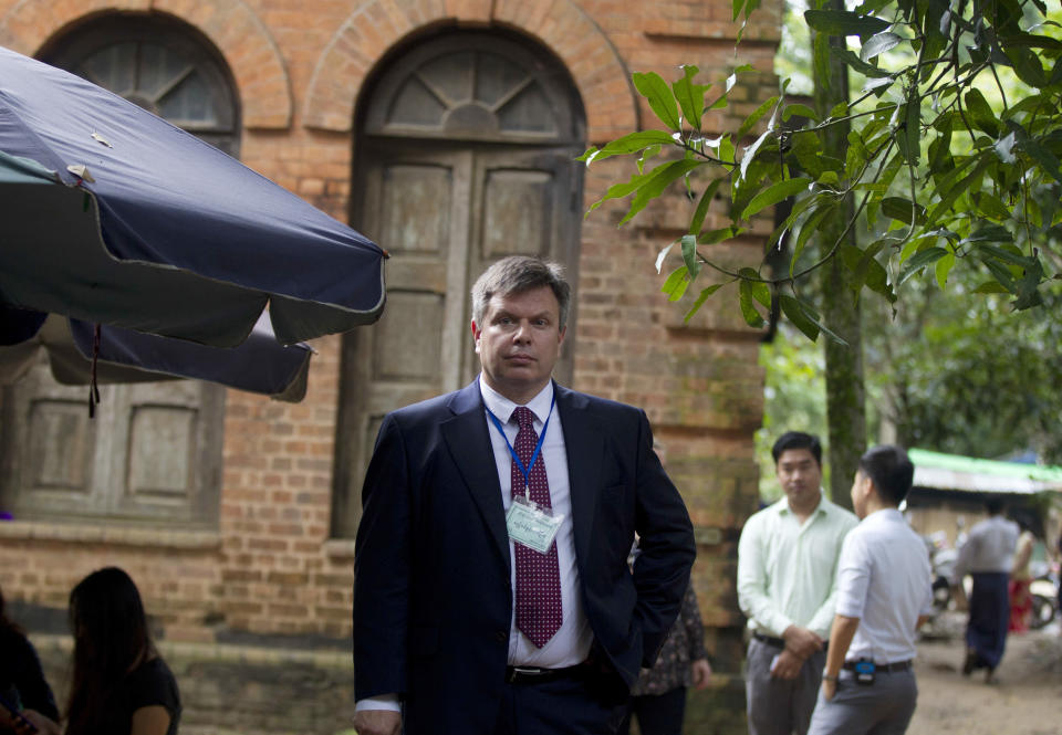 Kevin Krolicki, Reuters Regional Editor of Asia, stands as he arrives at the court for the trial of two Reuters journalists Monday, Sept. 3, 2018, in Yangon, Myanmar. The court sentenced two Reuters journalists to seven years in prison Monday for illegal possession of official documents, a ruling that comes as international criticism mounts over the military's alleged human rights abuses against Rohingya Muslims. (AP Photo/Thein Zaw)