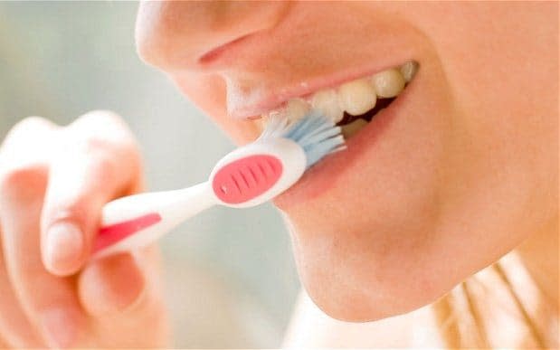 Using mouthwash after brushing teeth could kill harmful bacteria - © Chris Rout / Alamy