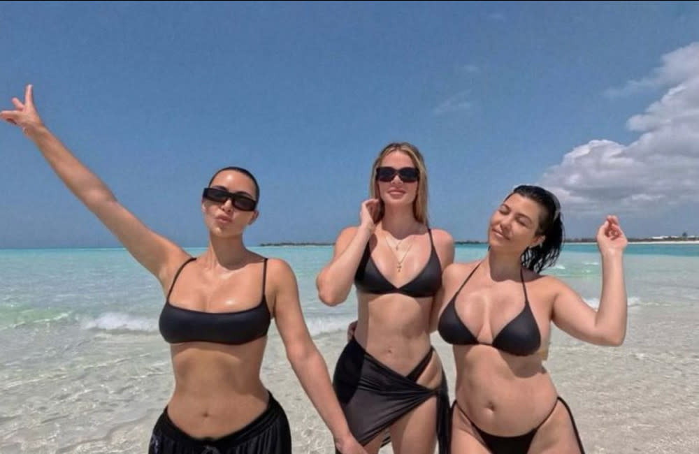 Kim Kardashian with her sisters Khloe and Kourtney on holiday credit:Bang Showbiz