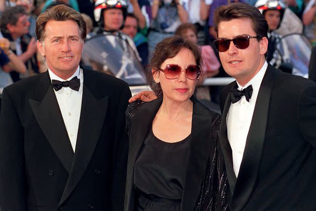 <p>Starstock/Photoshot/Everett Collection</p> Martin and Janet Sheen with their son, Charlie Sheen, at the 1990 Cannes Film Festival.