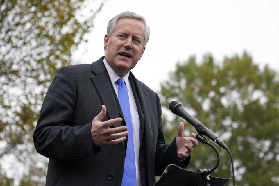 Former White House chief of staff Mark Meadows speaks with reporters outside the White House, Monday, Oct. 26, 2020, in Washington.