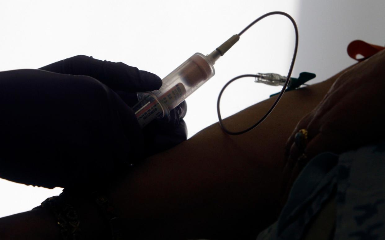 A patient having blood taken - Jacqueline Larma /AP