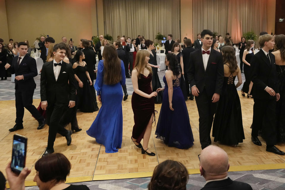 Students of Warsaw's Mikolaj Rej high school dance Poland's national polonaise dance to open their pre-graduation ball in Warsaw, Poland, on Feb. 3, 2024. Once banned by rulers dispatched from Moscow, Poland's stately polonaise dance that nurtured the country's spirit even through the dark years of its partition is now honored by the United Nations' education and culture agency, UNESCO. (AP Photo/Czarek Sokolowski)