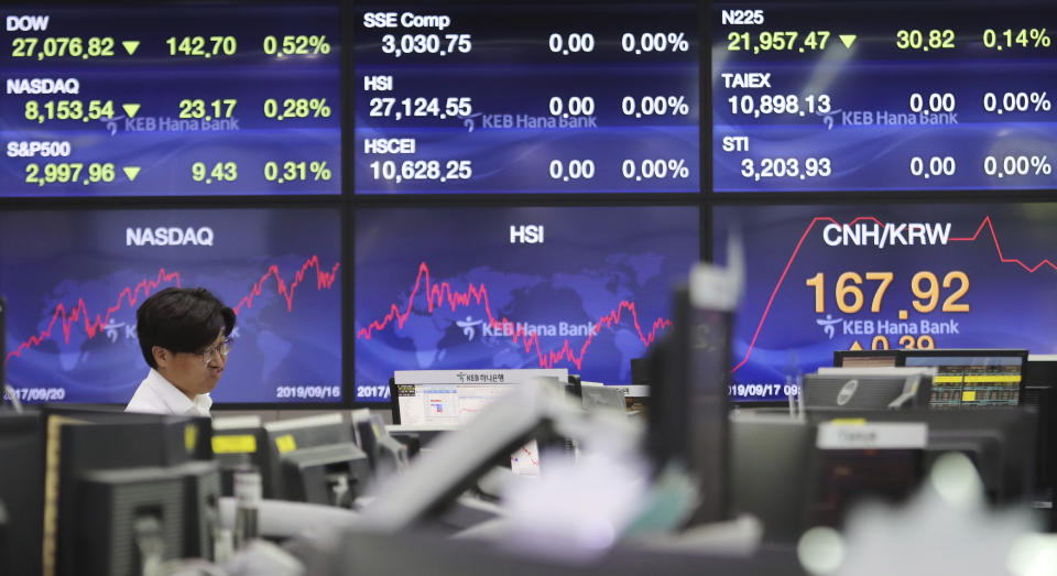 A currency trader watches monitors at the foreign exchange dealing room of the KEB Hana Bank headquarters in Seoul, South Korea, Tuesday, Sept. 17, 2019. Shares were mostly lower in Asia on Tuesday after an attack on Saudi Arabia’s biggest oil processing plant caused crude prices to soar, prompting selling of airlines and other fuel-dependent industries. (AP Photo/Ahn Young-joon)