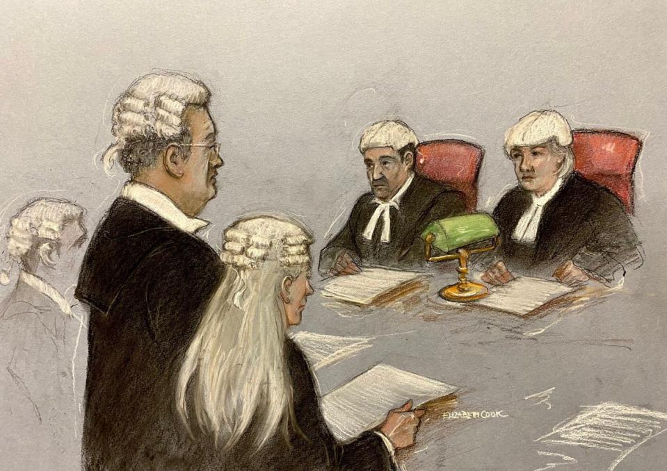 Court artist sketch of Julian Assange's barrister Edward Fitzgerald KC, on his feet in front of judges, Mr Justice Johnson and Dame Victoria Sharp (PA)