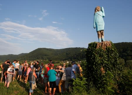 Life-size wooden sculpture of U.S. first lady Melania Trump is officially unveiled in Rozno, near her hometown of Sevnica