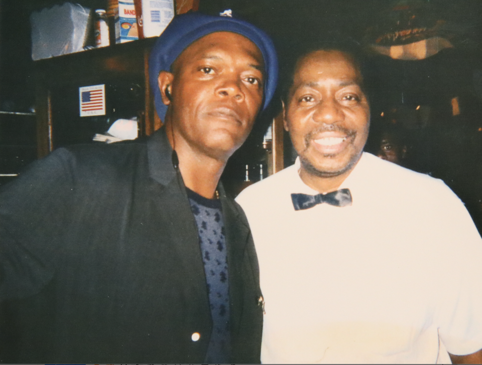 Actor Samuel L. Jackson posed with waiter Percy Norris during a visit to The Rendezvous.