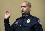 U.S. Capitol Police Sgt. Aquilino Gonell is sworn in before the House select committee hearing on the Jan. 6 attack on Capitol Hill in Washington, Tuesday, July 27, 2021. (Chip Somodevilla/Pool via AP)