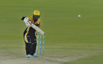 Peshawar Zalmi' Sherfane Rutherford plays a shot during a Pakistan Super League T20 cricket match between Quetta Gladiators and Peshawar Zalmi at the National Stadium, in Karachi, Pakistan, Friday, Feb. 26, 2021. (AP Photo/Fareed Khan)