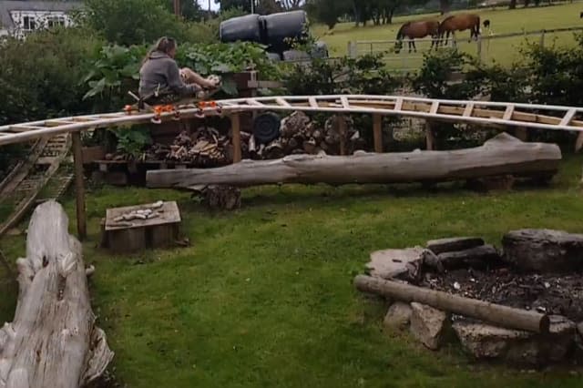 Uncle makes nephew's dream come true when he builds rollercoaster in the back garden - using scrap metal, wood and plastic pipes