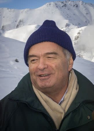 Uzbekistan's President Islam Karimov smiles at the ski resort Chimbulak outside Almaty, Kazakhstan, January 6, 2001. Picture taken January 6, 2001. REUTERS/Shamil Zhumatov/File Photo