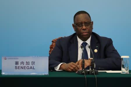 FILE PHOTO: Senegal's President Macky Sall speaks at the 2018 Beijing Summit of Forum on China-Africa Cooperation joint news conference at the Great Hall of the People in Beijing, China September 4, 2018. Lintao Zhang/Pool via REUTERS/File Photo