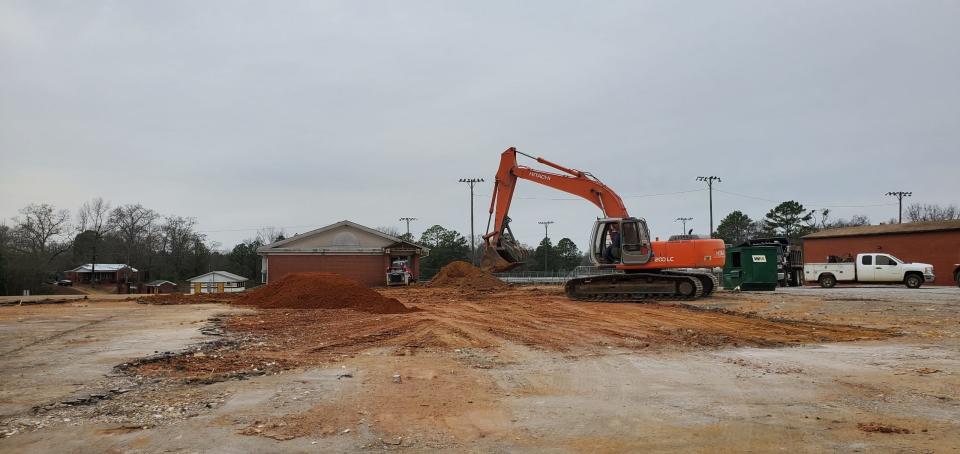 Construction equipment works on the site of the former Billingsley School, most of which has been razed.