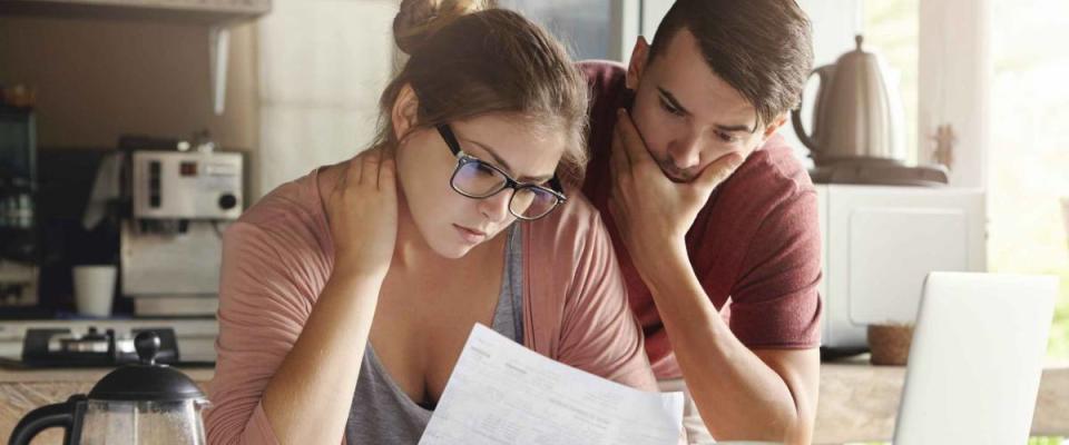 A couple doing their taxes.