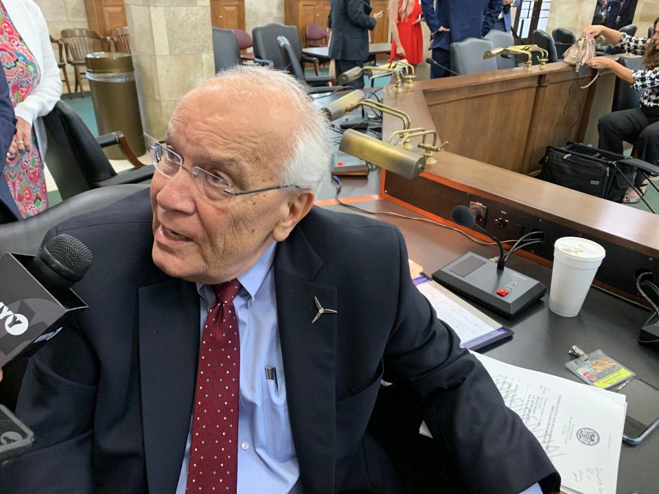 Joseph L. Fiordaliso, president of the New Jersey Board of Public Utilities, talks to reporters after awarding a proposal to build a wind farm off the coast of Atlantic City.