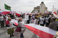 Polish farmers and other protesters gather in downtown Warsaw to protest the European Union's climate policies and Poland's pro-EU government, in Warsaw, Poland, Friday, May 10, 2024. (AP Photo/Czarek Sokolowski)