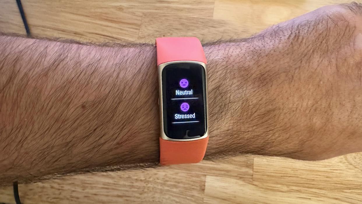  The post-EDA sensor reading screen showing mood options on the Fitbit Charge 6. 