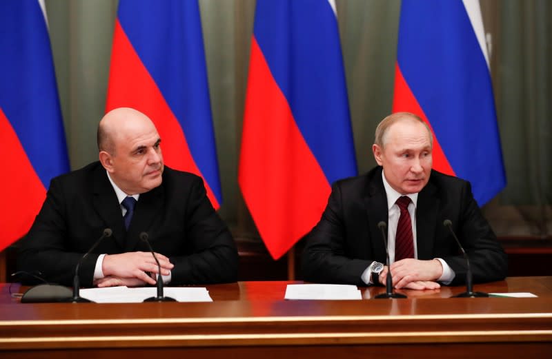 Russian President Vladimir Putin and Prime Minister Mikhail Mishustin hold a meeting with members of the new government in Moscow