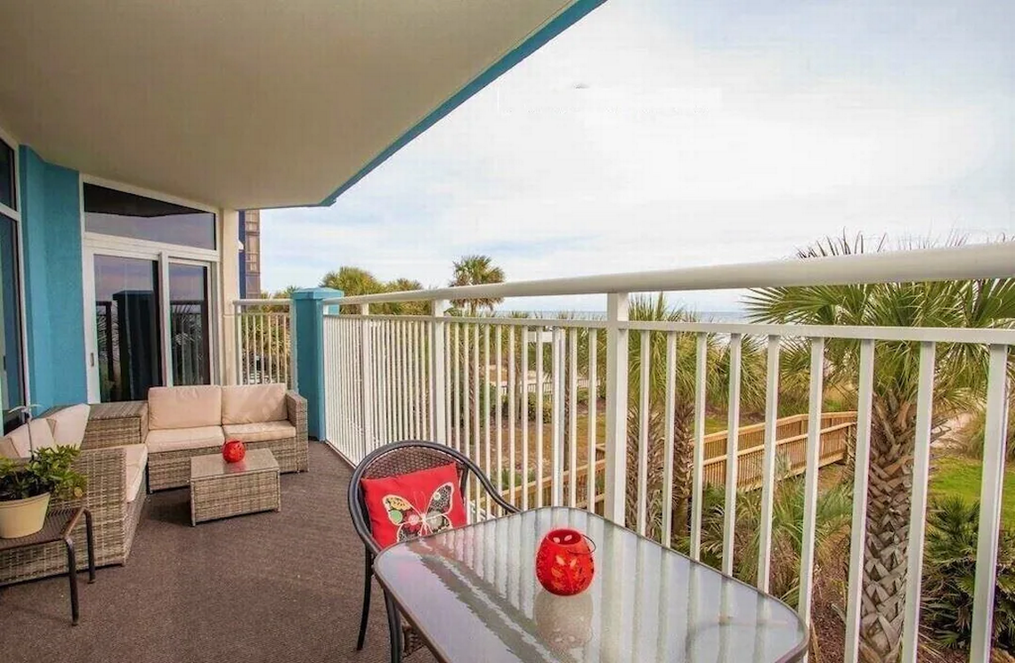 Balcony at Ocean Blue 202 condo in Central Myrtle Beach. Screenshot of listing. January 5, 2022.